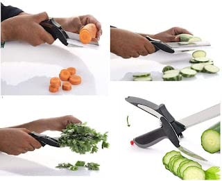 Black multi functional kitchen scissors cutting carrots cucumbers and herbs with safety guard