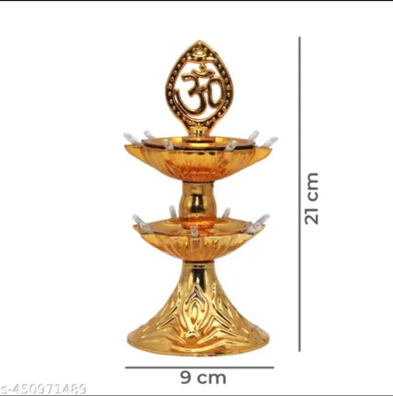Gold two tier brass oil lamp with Om topper 21 cm height 9 cm base decorative diya for Diwali pooja