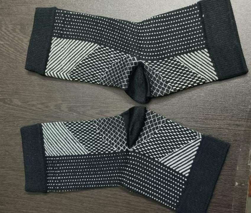 Black and gray heel swelling relief socks designed for comfort and support during recovery