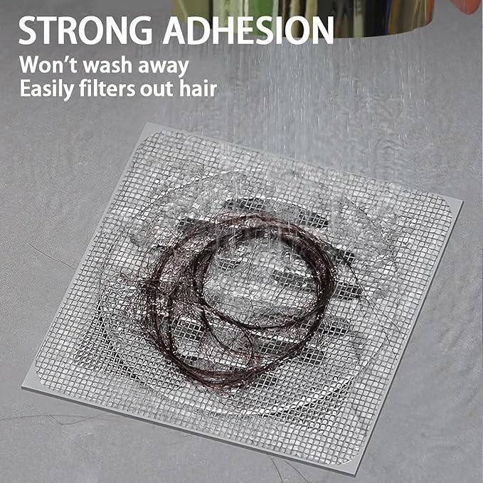 Square adhesive drain strainer catching hair under running water showing strong adhesion shower mesh drain catcher stickers
