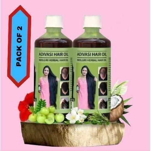 Adivasi oil pack for long hair, featuring two bottles of herbal oil with natural ingredients for hair care.