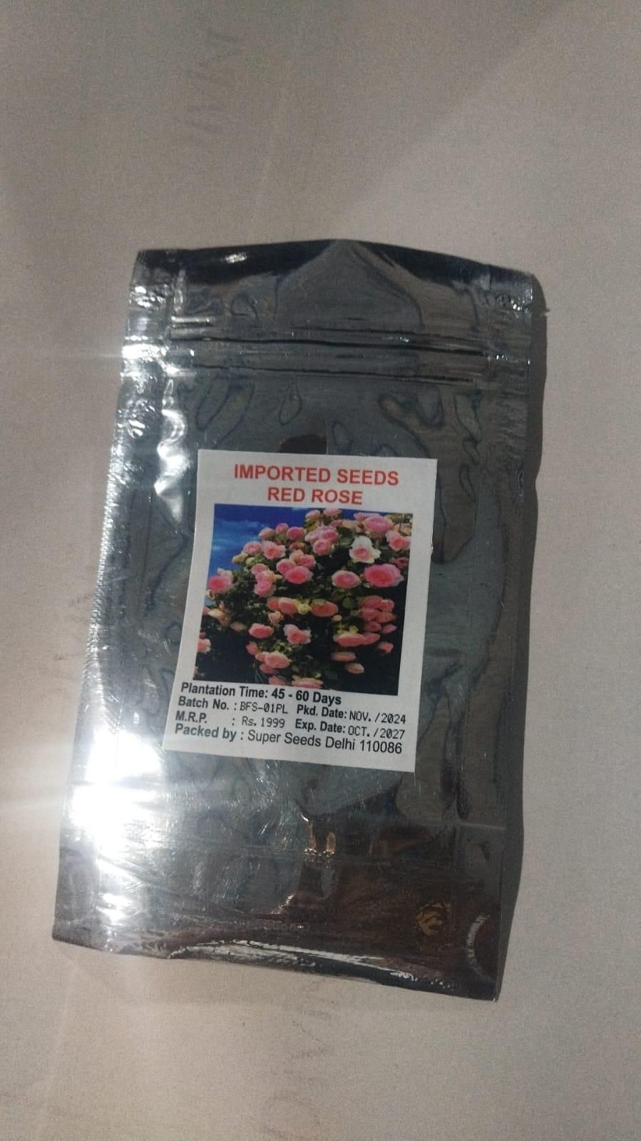 Imported Climbing Rose Seeds packet with colorful rose flower image and planting instructions