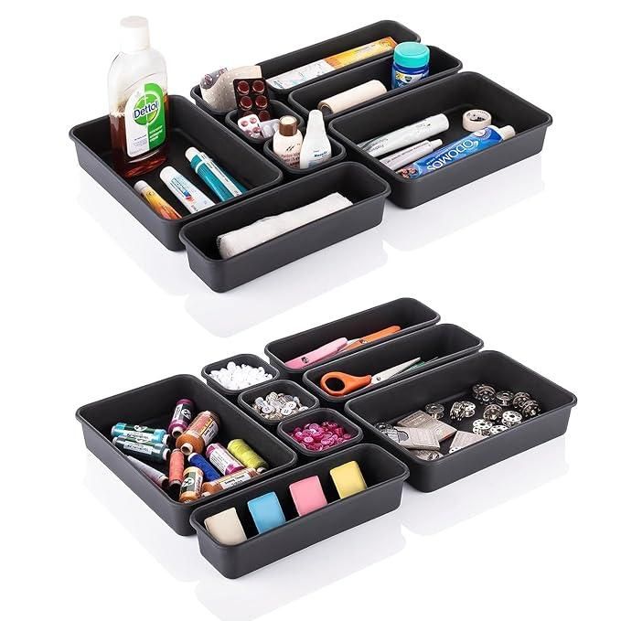 Multi-compartment drawer organizer in black for organizing office supplies and craft materials