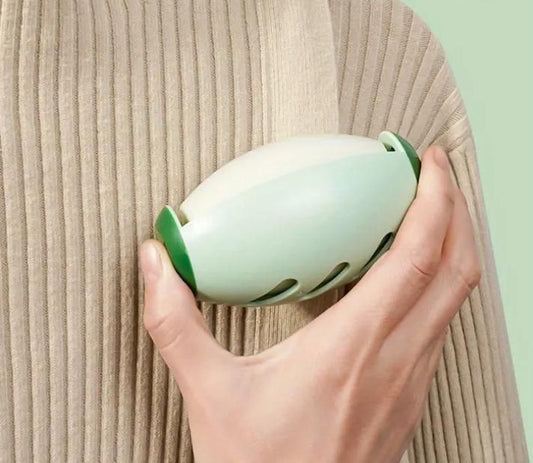 Compact portable silicone lint roller for removing lint and pet hair from clothing and fabrics