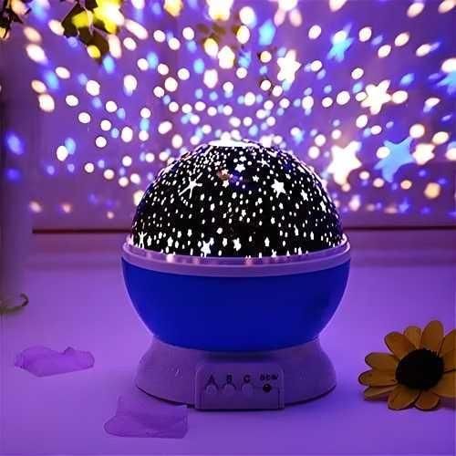 Colorful moon night light projector with star patterns illuminating the room